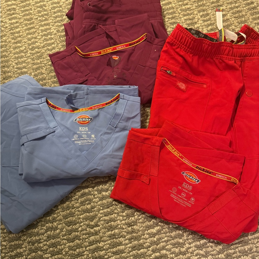 Dickies Scrub Set in Burgundy, Light Blue, and Bright Red